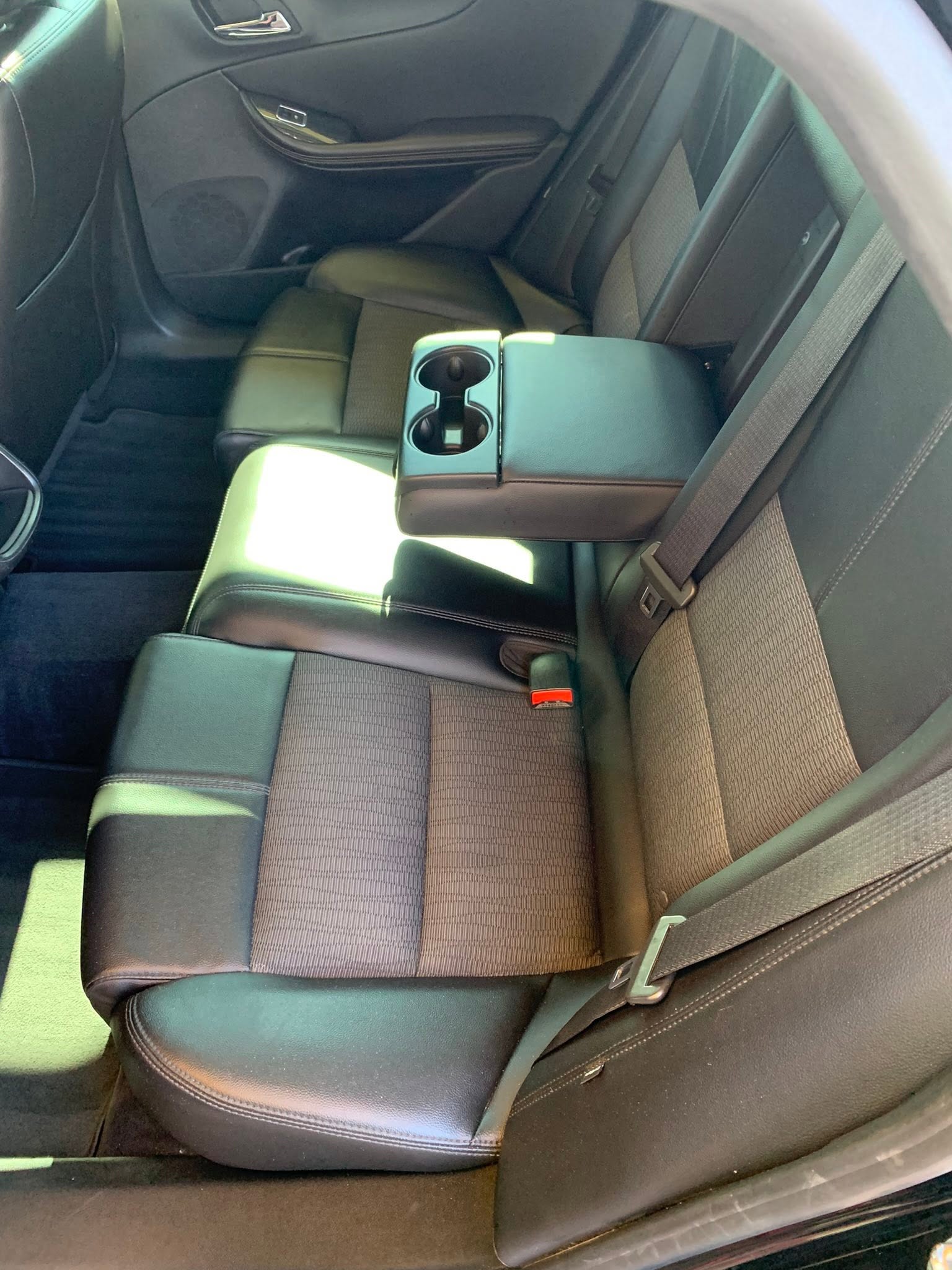 Clean detailed vehicle rear seat